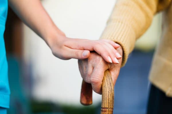 depositphotos 30089449 stock photo helping the elderly
