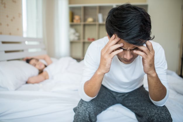 upset man having problem sitting bed after arguing with his girlfriend 1150 4908